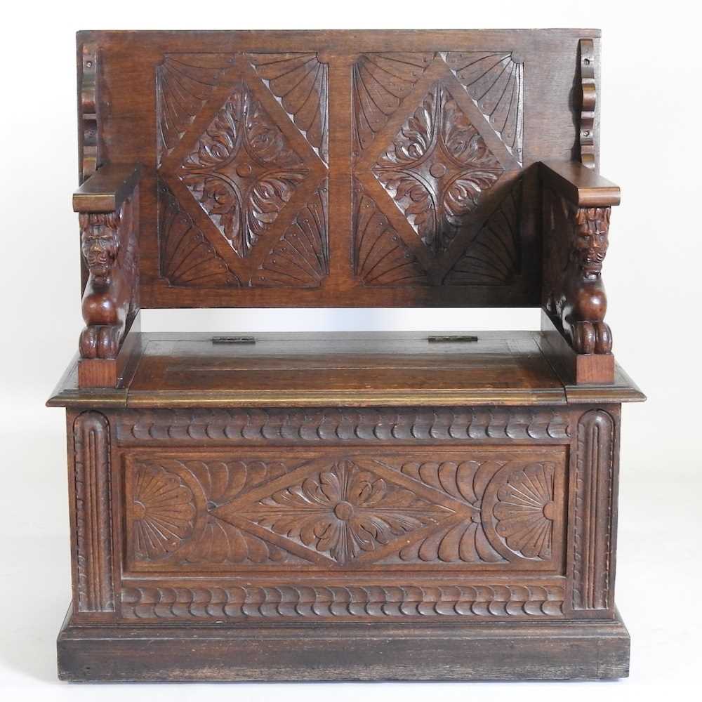 An early 20th century carved oak monk's bench, with griffin supports 92w x 50d x 82h cm - Image 8 of 10