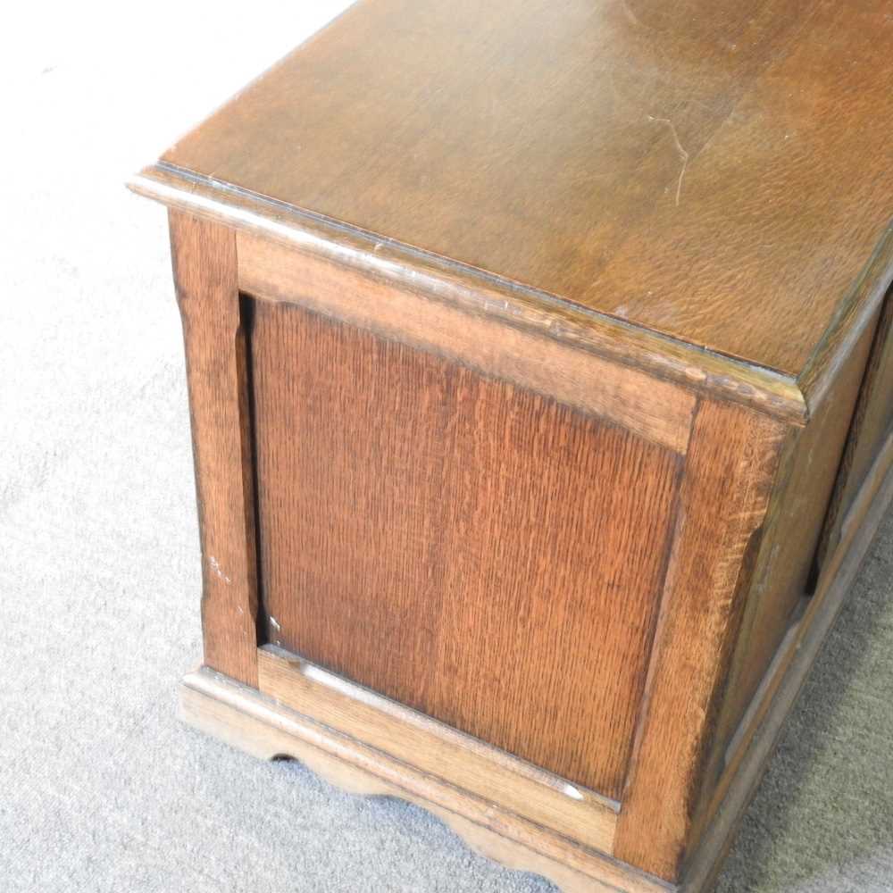 A 1920' s oak blanket box, with a hinged lid and linenfold front 90w x 44d x 54h cm - Image 5 of 6