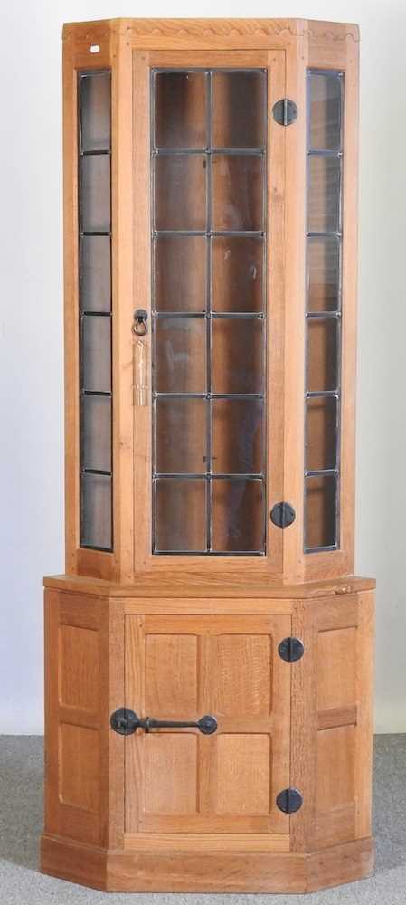 Robert 'Mouseman' Thompson, of Kilburn, a light oak standing corner cabinet, enclosed by a lead - Image 6 of 7