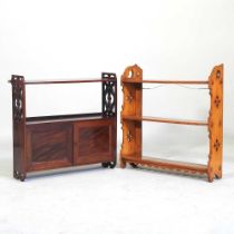 An Edwardian mahogany hanging shelf, 56cm wide, together with another (2)