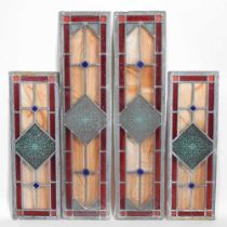 A pair of leaded stained glass windows, together with another smaller (3) 74 x 17cm and 54 x 17cm.