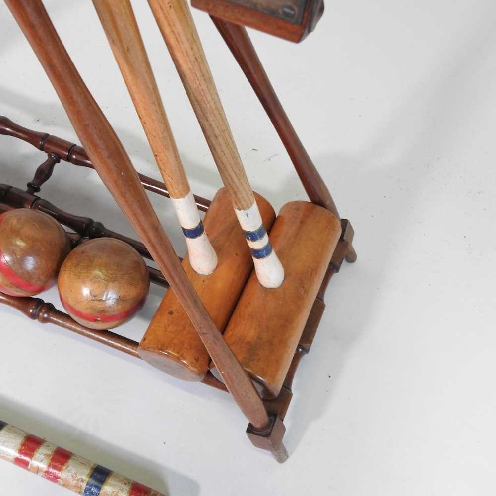 A mid 20th century F.H. Ayers, London wooden The Usborne patent Croquet Carrier Stand, with four - Image 11 of 14