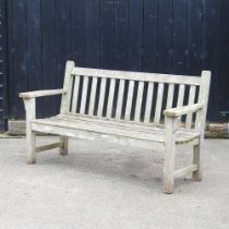 A slatted hardwood garden bench 160w x 62d x 90h cm