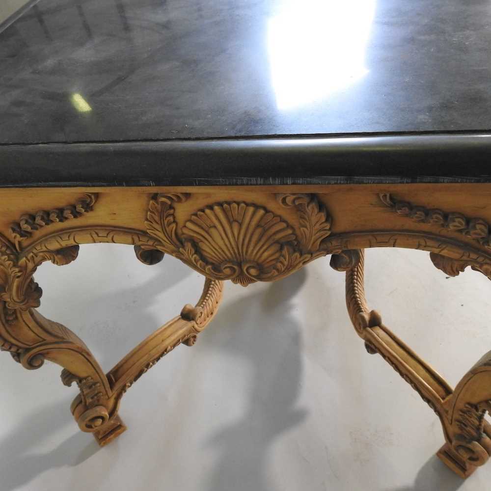 A large continental carved wood centre table, 20th century, the rectangular marble top, on an ornate - Image 2 of 11