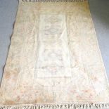 A Turkish woollen carpet, with all over designs on a cream ground, 280 x 190cm