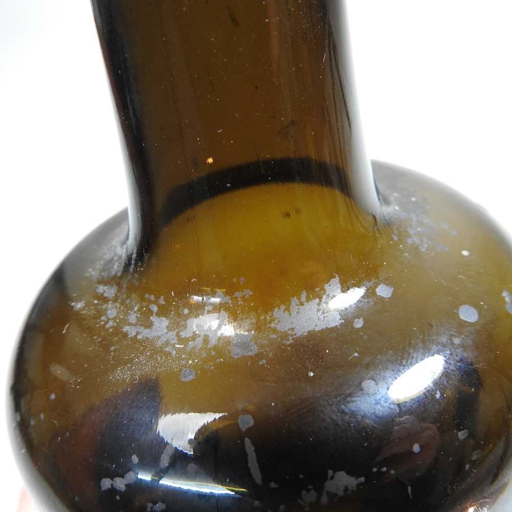 An 18th century English brown glass sealed wine bottle, inscribed All Souls Coll:C:R, 26cm high - Image 12 of 15