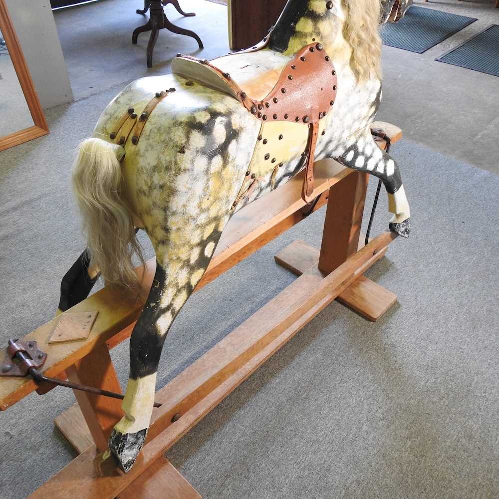 An early to mid 20th century painted wooden dappled grey rocking horse, on a wooden trestle base - Image 4 of 7