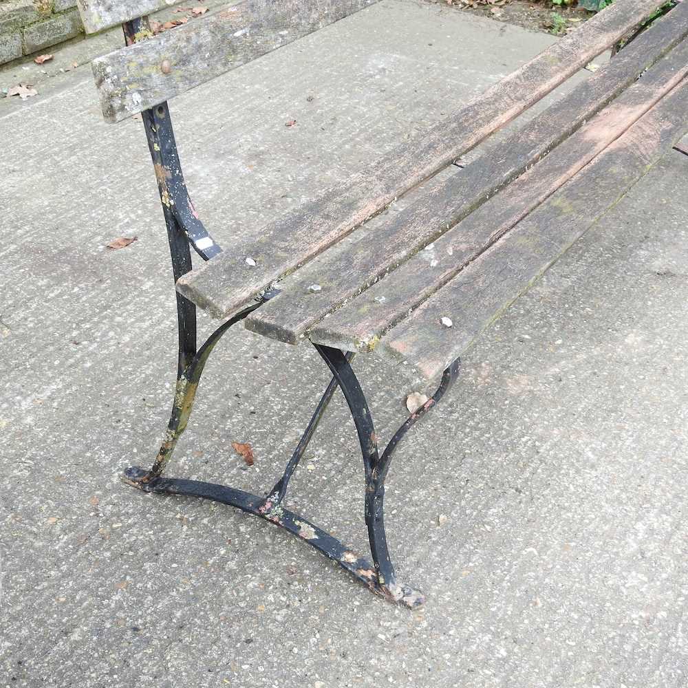 A slatted garden bench, on painted iron supports 183w x 50d x 82h cm - Image 2 of 3