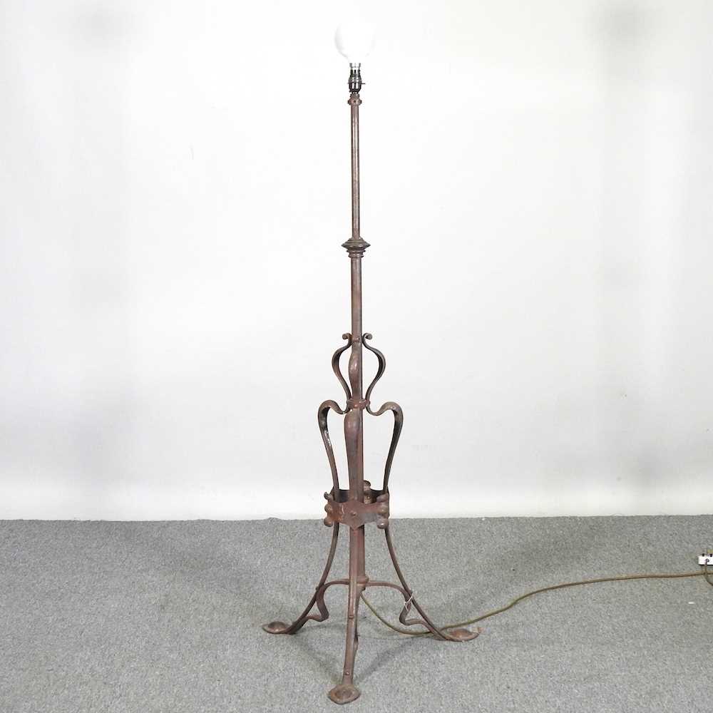 An Arts and Crafts steel telescopic standard lamp, 140cm high Overall condition is solid but poor,