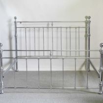 A Victorian style chrome effect Super King size double bedstead, with a slatted wooden base, 194cm