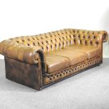 A leather upholstered chesterfield sofa, with a button back 200w x 86d x 69h cm Overall condition is