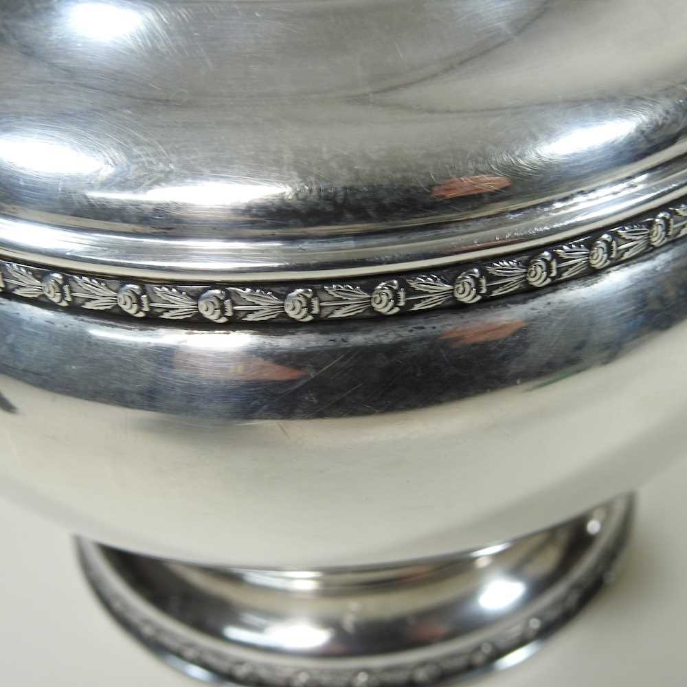 An early 20th century silver four piece tea service, of circular shape, with ebonised handles and - Image 5 of 8
