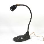 A mid 20th century adjustable table lamp