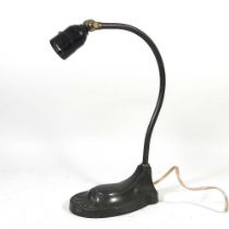 A mid 20th century adjustable table lamp