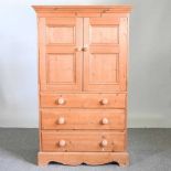 A modern pine cabinet, with drawers below 95w x 49d x 158h cm