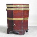 A George III mahogany and brass bound cellarette, of octagonal shape, with a hinged lid 49w x 49d