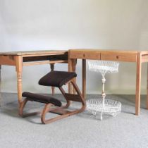 A modern light oak desk, 1110cm wide, together with a pine work table, a bentwood stool and a wire
