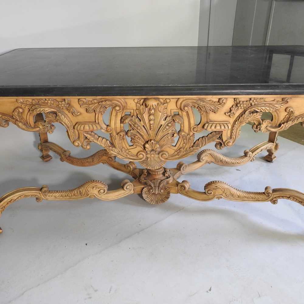 A large continental carved wood centre table, 20th century, the rectangular marble top, on an ornate - Image 8 of 11