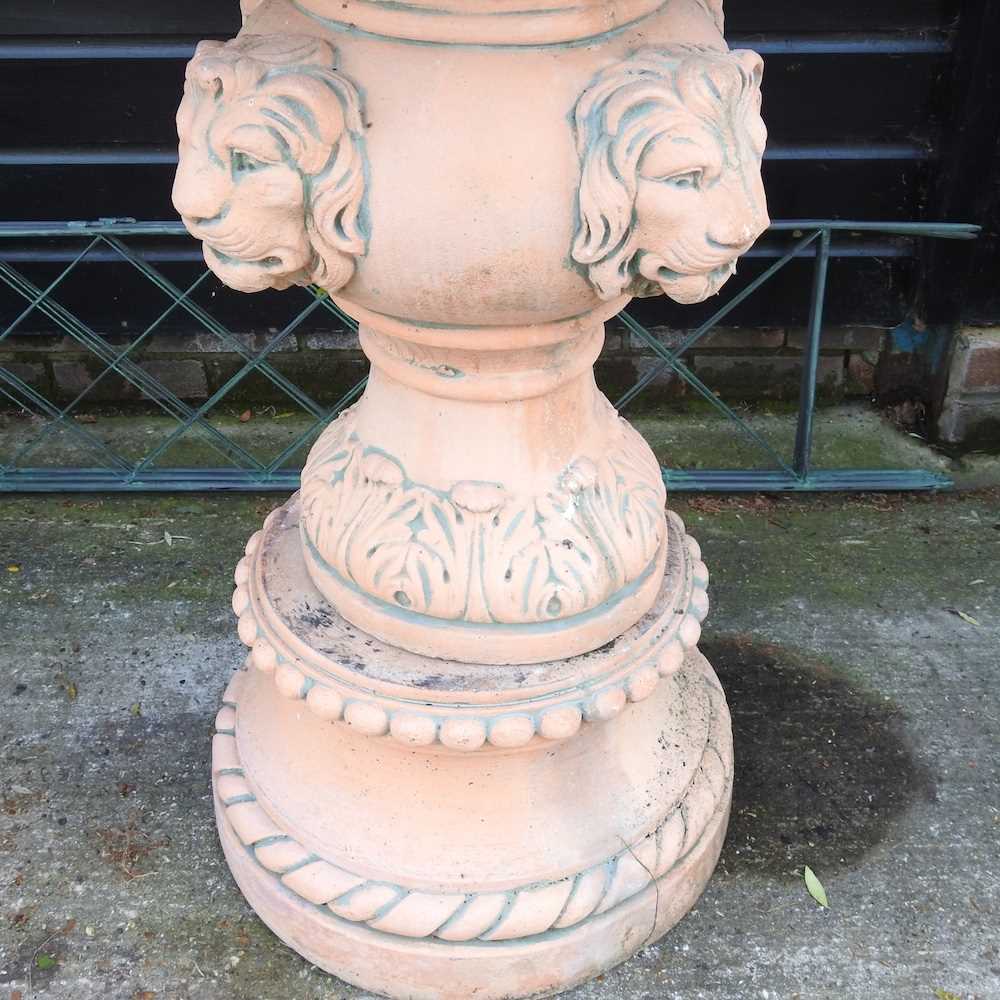 A large terracotta coloured stone garden fountain, with lion mask decoration, on a plinth base, - Image 5 of 5