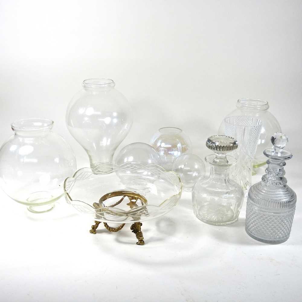 A 19th century cut glass decanter and stopper, of mallet shape, 21cm high, together with another,