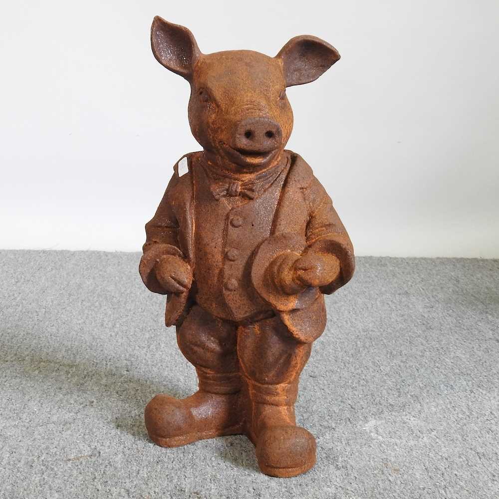 A rusted metal model of Mr Pig, 45cm high