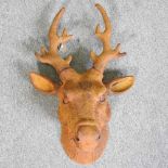 A large rusted model of a deer head, 62cm high 40w x 60h cm