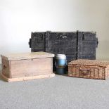 A vintage black painted wooden naval travel trunk, together with a pine box, a picnic hamper and