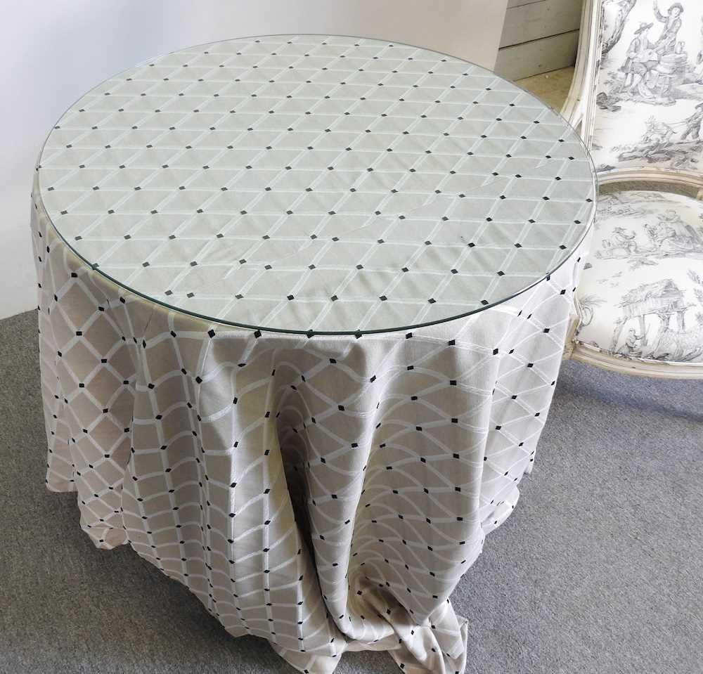 A circular occasional table, with a fabric cover and glass top, together with a black and white - Bild 3 aus 4