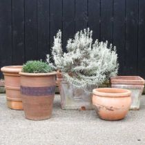 A terracotta pot, 40cm high, together with four other various garden pots (5)