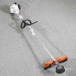 A Stihl petrol strimmer