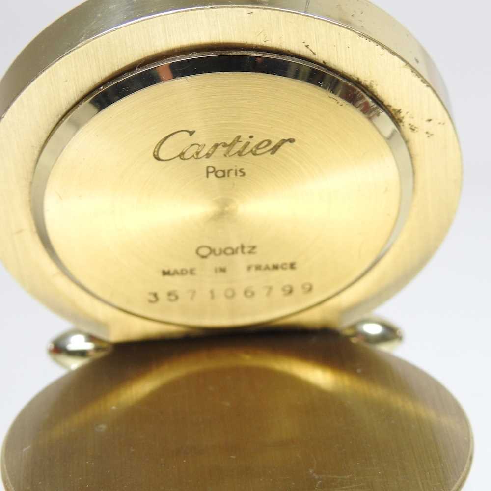 A Must de Cartier boudoir clock, having a signed dial and folding case, numbered 357106799, 5cm - Image 5 of 10