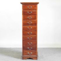 A narrow chest, containing a row of ten narrow drawers 42w x 41d x 130h cm