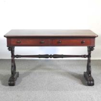 A Victorian mahogany sofa table, on carved end supports 125w x 65d x 75h cm