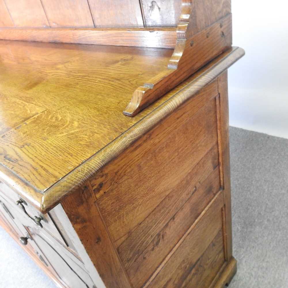 An 18th century style oak dresser, with a boarded back, on bracket feet 143w x 216h x 51d cm - Bild 8 aus 9