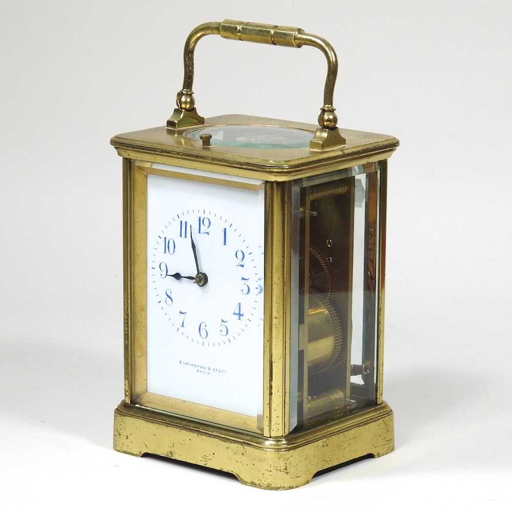 A 19th century brass cased carriage clock, the dial signed Elkington & Co Ltd, Paris, with push