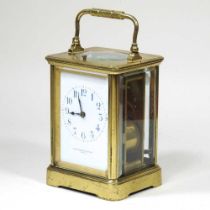 A 19th century brass cased carriage clock, the dial signed Elkington & Co Ltd, Paris, with push
