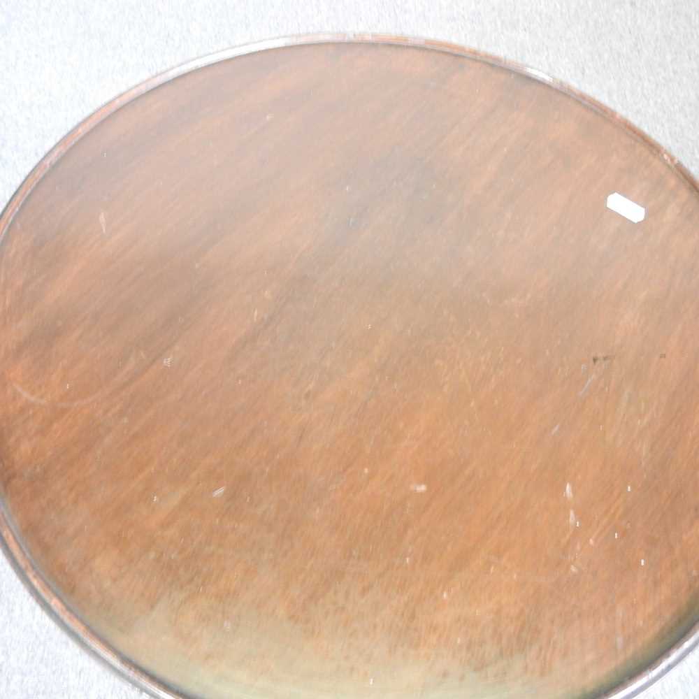 A George V mahogany wine table, with a hinged circular top, on a tripod base, stamped GV to the - Bild 3 aus 4