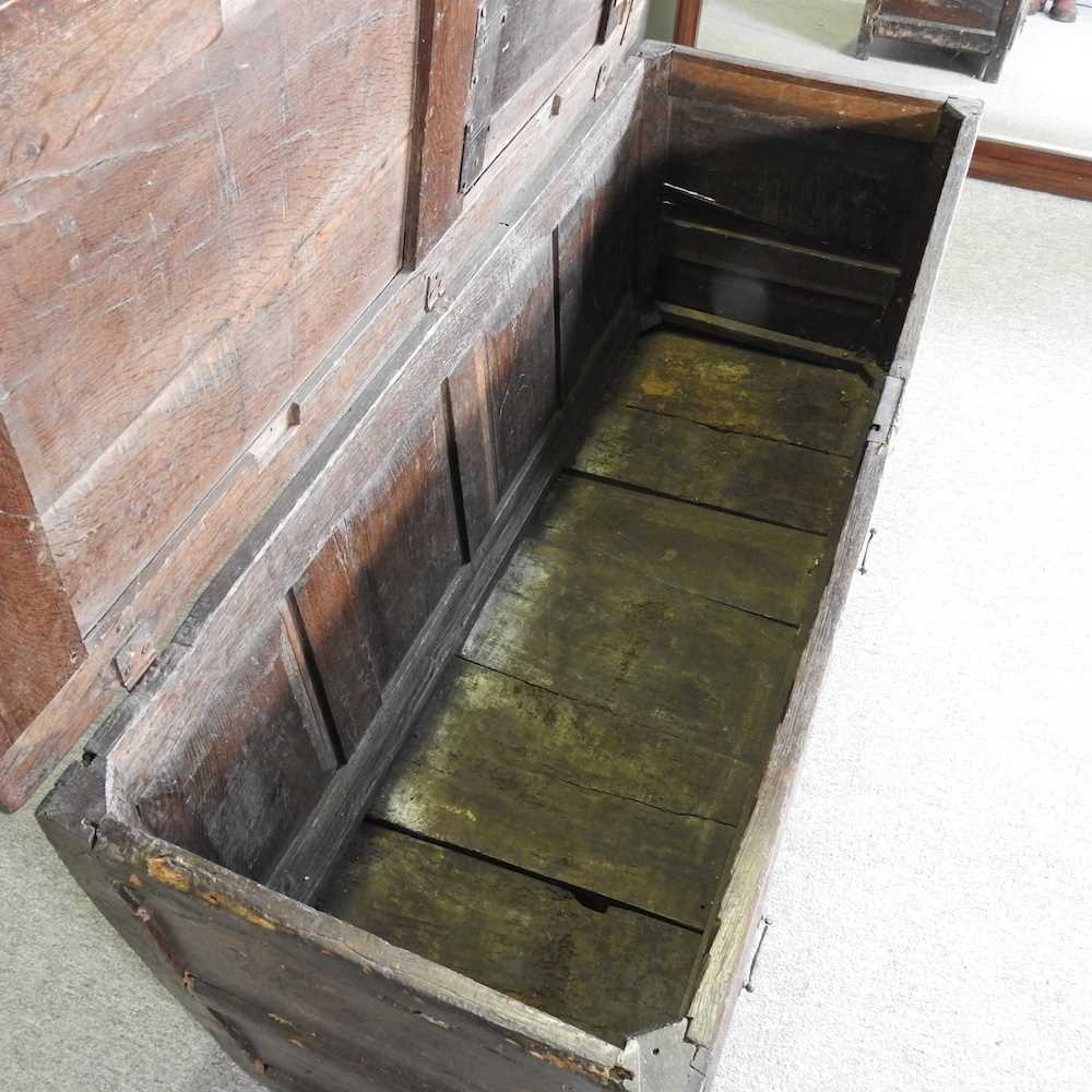 An 18th century oak mule chest, with a panelled front and drawers below 133w x 51d x 72h cm - Image 4 of 5