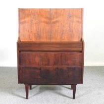 Attributed to Robert Heritage, a 1960's hardwood secretaire, with a hinged fall, on tapered legs 76w