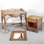 A wicker dressing table, 98cm wide, together with a mirror and a matching bedside cabinet (3) 98w