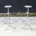 A pair of painted metal tiered plant stands (2) 55w x 78h cm