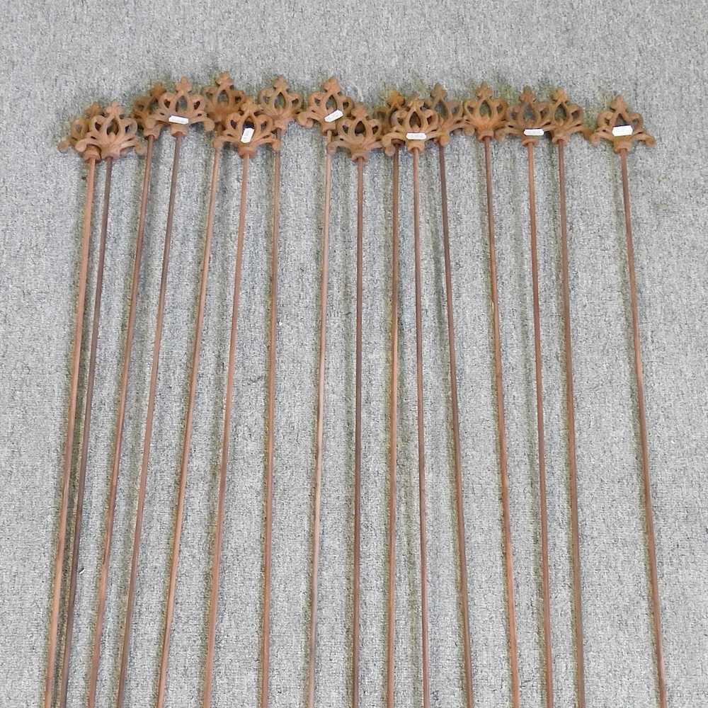 A set of sixteen metal plant stakes, 109cm high