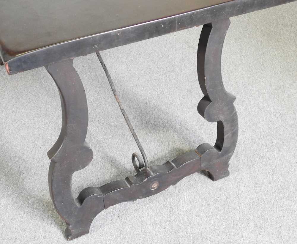 A Spanish dining table, 20th century, on a splayed base with iron supports 151w x 76d x 76h cm - Image 4 of 5