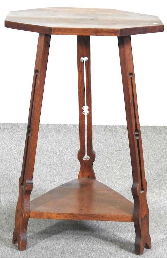 An Art Nouveau oak occasional table, with an octagonal top, on a splayed base 51w x 51d x 75h cm - Image 3 of 4