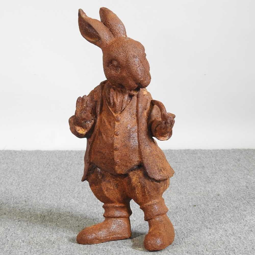 A rusted garden model of Mr Rabbit, 44cm high
