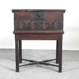 A 19th century carved oak Bible box, inscribed H G, on a later stand 55w x 44d x 66h cm