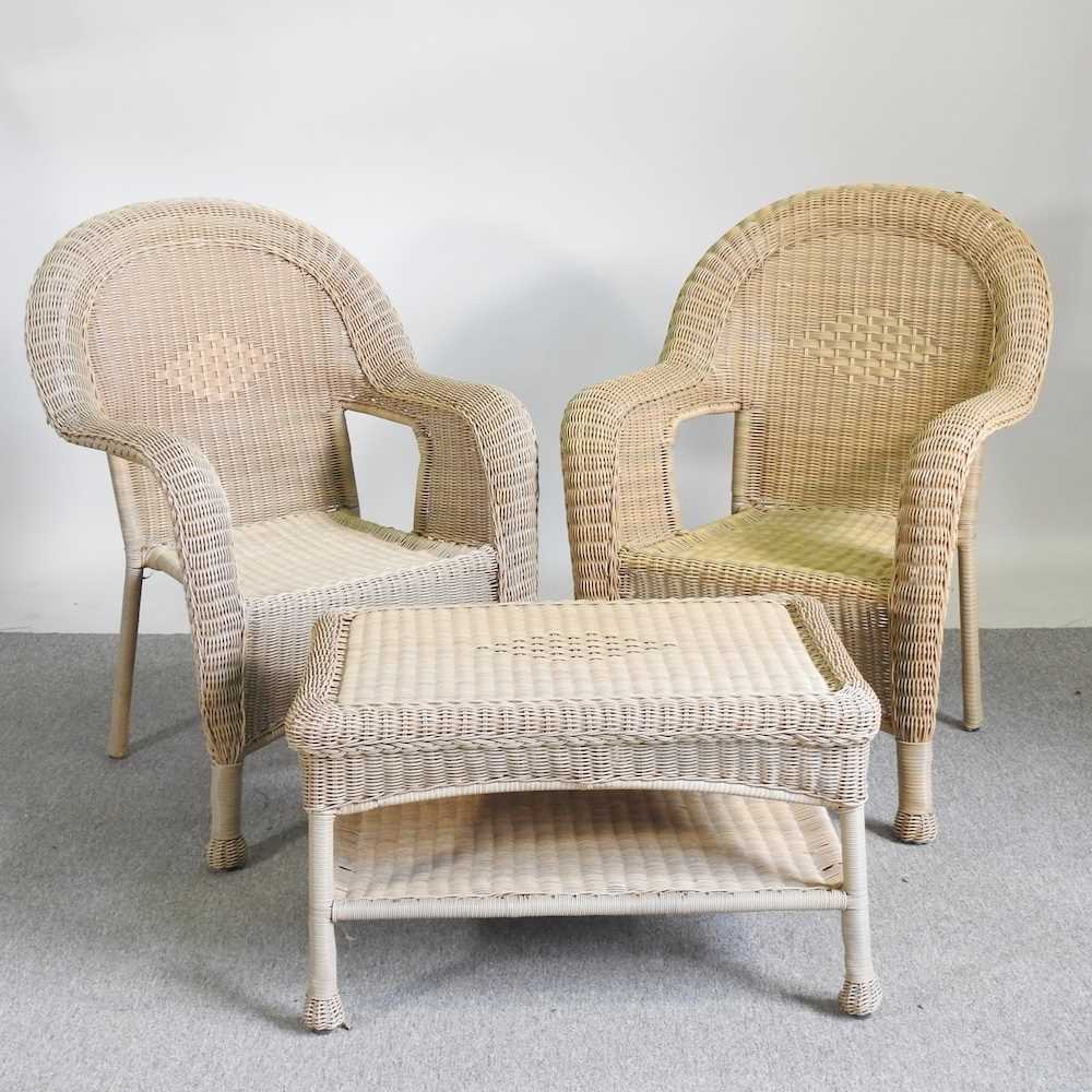 A pair of wicker armchairs, together with a matching coffee table (3)