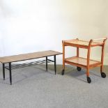 A 1970's G plan style teak coffee table, 122cm wide, together with a Sophie hostess trolley (2)