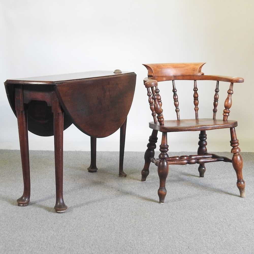 An early 20th century elm seated smokers bow armchair, together with an 18th century pembroke