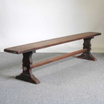 An early 20th century elm bench 210w x 25d x 46h cm